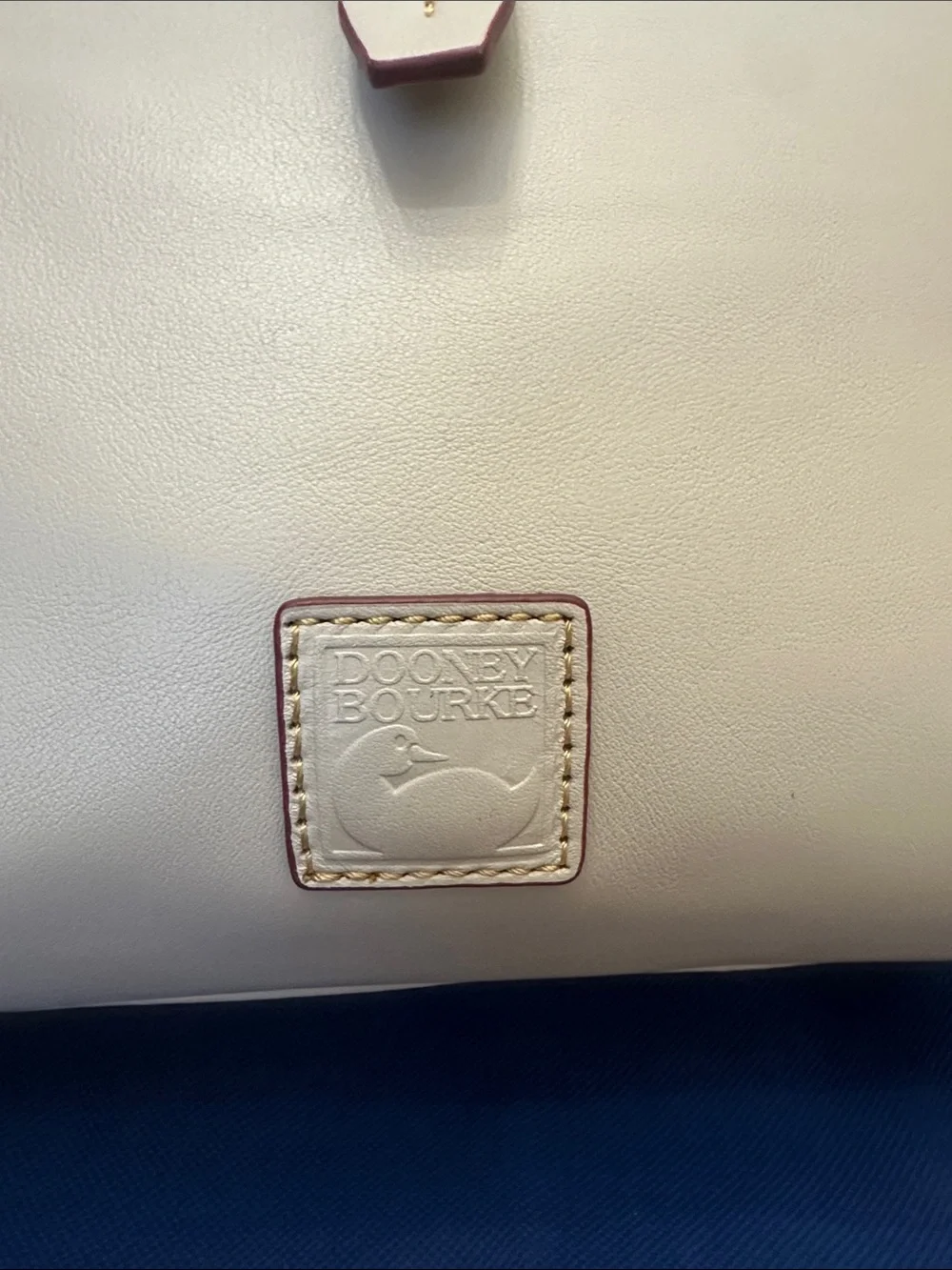 Dooney & Bourke cream leather